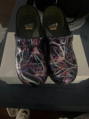 Dansko Multicolor Paint-Striped Clogs on Black